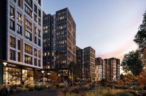 3D render of high-rise apartment towers at dusk with illuminated windows along a landscaped, lit walkway